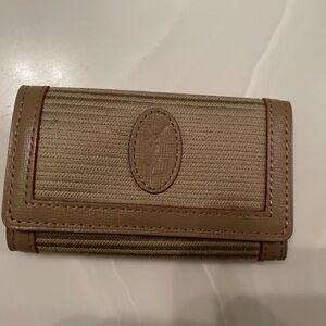 Used Vintage YSL key holder.